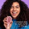 imageConair Curl Define Pro Mini Detangler Brush for Tight Curls DualVent Design Curl Defining Brush with Continuous Grooves Mixed Bristles for FrizzFree Detangling Smoothing and Definition PinkPink