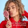 imageConair Curl Define Pro Mini Detangler Brush for Tight Curls DualVent Design Curl Defining Brush with Continuous Grooves Mixed Bristles for FrizzFree Detangling Smoothing and Definition PinkPink